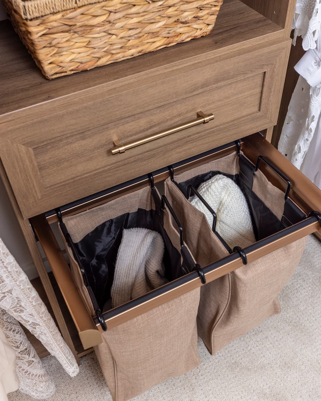Pull-out hamper drawer with walnut finish